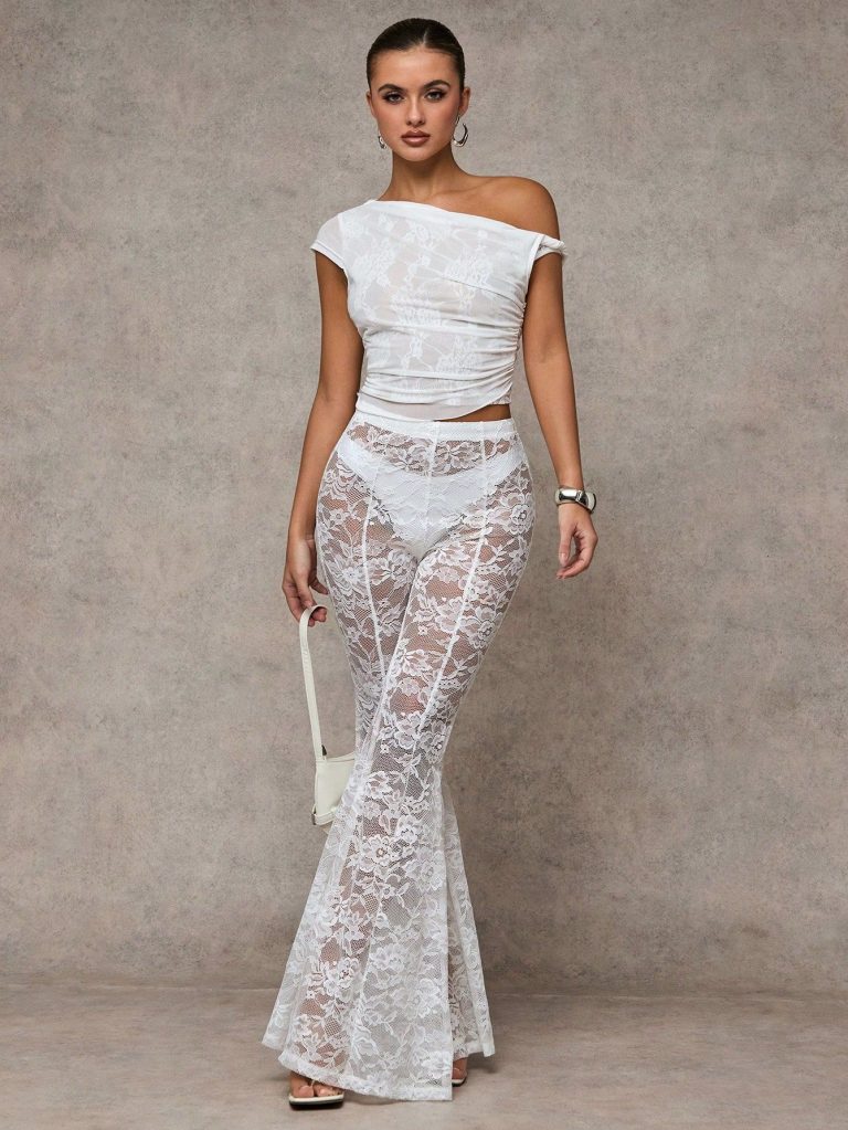 Pantalon évasé transparent en dentelle noire sexy pour sortie de nuit, soirée rave, soirée en boîte de nuit, enterrement de vie de jeune fille, tenue de fête à thème. Pantalon noir style années 70